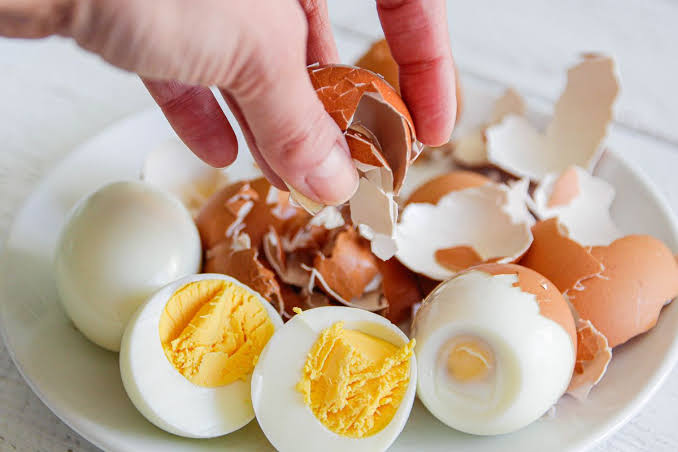 The Secret to Peeling Hard Boiled Eggs with Spotless Smooth Whites images